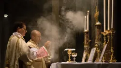 A priest celebrates the traditional Latin Mass at the Basilica of St. Pancras in Rome. Thoom/Shutterstock